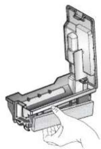 Illustration of a hand inserting a component into a device housing (no text or symbols visible)