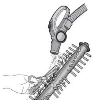 Illustration of a hand using a vacuum cleaner to clean or store items on a brush (no text or symbols visible)