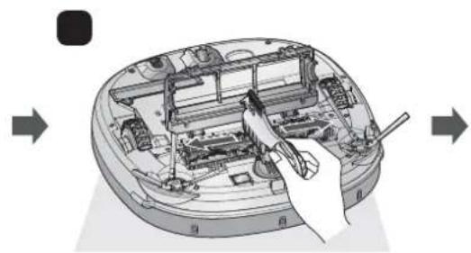 Diagram of a device's internal components being processed with a tool, showing no text or symbols