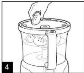 Line drawing of a hand placing food into a steamer (no text or symbols)