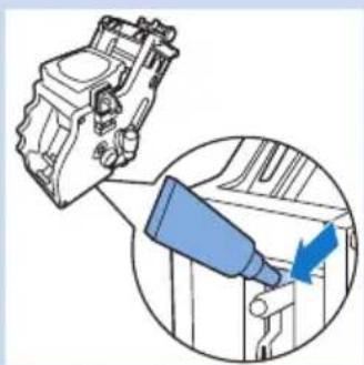 Diagram showing a mechanical component being inserted into a housing, with a magnified inset highlighting the component (no text or symbols present)