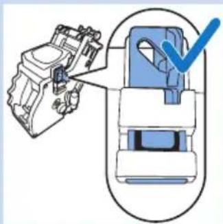 Diagram of a robotic arm and a mechanical device with a checkmark (no text or symbols present)