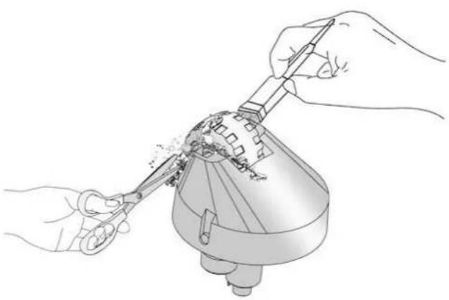 Line drawing of hands using scissors to handle a mechanical component (no text or symbols)