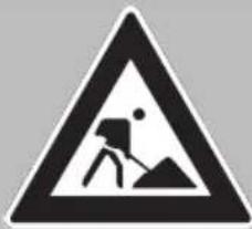 Warning sign depicting a person digging with a pile, symbolizing occupational hazard or hazard.