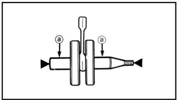 Diagram of a mechanical device with labeled parts 'a' and directional arrows indicating movement or force.