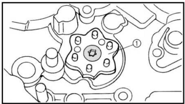 Technical diagram of a mechanical component with numbered parts and a central star-shaped feature