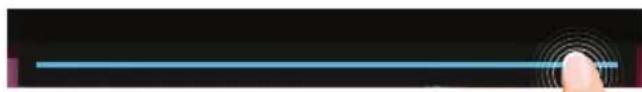 Close-up of a finger pressing a horizontal blue stripe on a dark surface, with concentric rings and a small circular mark in the corner, no text or symbols visible.
