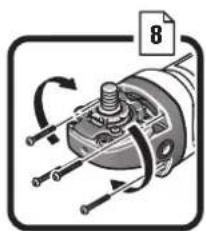 Mechanical diagram of a motor or generator with rotating components and directional arrows (no text or symbols)