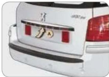 Rear view of a white car trunk with red accent highlights and logo (no visible text or symbols)