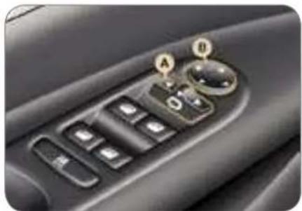 Close-up of a car interior control panel with labeled buttons (A, B, C) and a dial indicator (O), no readable text or symbols beyond labels.