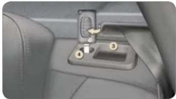Close-up of a car seatbelt switch mechanism (no text or symbols visible)