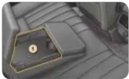 Interior view of a car with a highlighted rectangular area containing a numbered badge (no visible text or symbols)