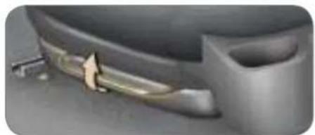 Close-up of a metallic tool interacting with a curved mechanical component (no visible text or symbols)