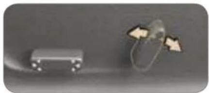 Two electronic components: a rectangular block and a transparent ring with three arrows indicating motion or interaction (no text or symbols visible)