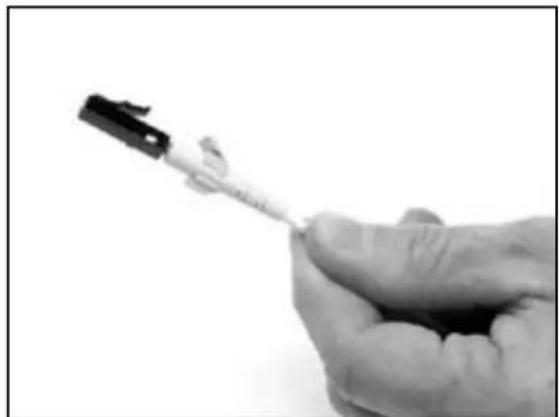 Close-up of a hand holding a medical or laboratory tool, possibly a syringe or catheter, with no visible text or symbols.