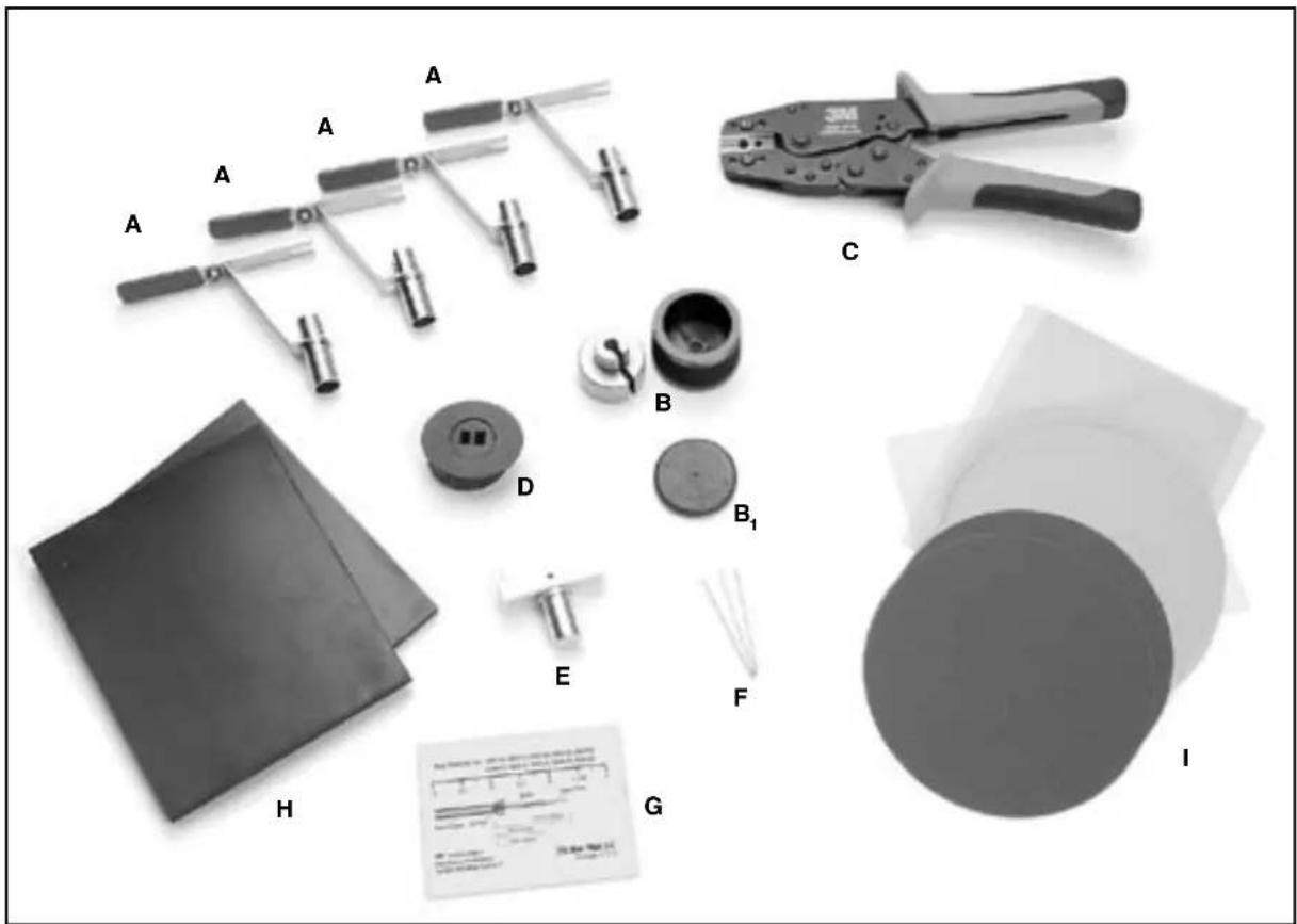 Labeled diagram of mechanical components and parts, including pliers, tools, and a circular sample with printed specifications.