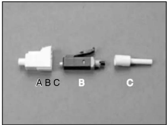 Three white electronic components labeled ABC, B, and C on a plain background (no text or symbols on the objects themselves)