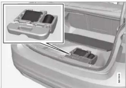 Close-up of a car's front bumper showing internal plastic housing and casing (no text or symbols visible)
