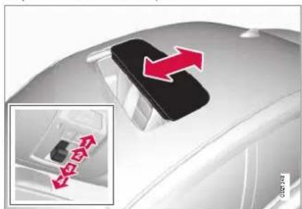Close-up of a car's rear seatbelt with red directional arrows indicating movement or change (no text or symbols)
