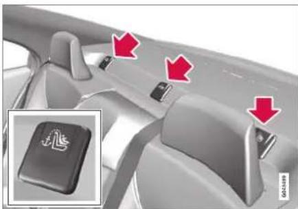 Interior view of a car dashboard with a highlighted key and red arrows indicating directional changes (no text or symbols present)