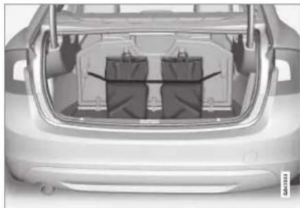 Top-down view of a car trunk with two rear cargo bags (no visible text or symbols)