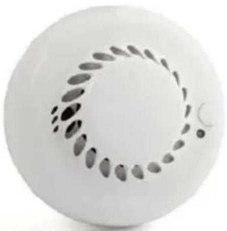 Circular object with a circular pattern and a small crescent, resembling a stylized moon or button (no text or symbols)