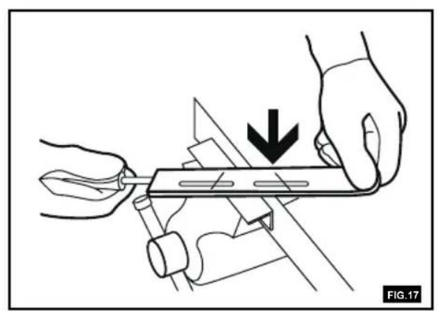 Illustration of hands using a tool to cut or adjust a mechanical component, with a downward arrow indicating the process (no text or symbols present)