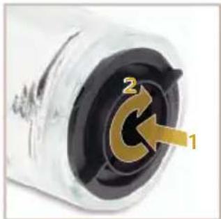 Close-up of a mechanical component with labeled parts (1, 2), no readable text or symbols beyond labels