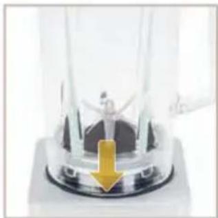 Close-up of a transparent cylindrical device with a yellow arrow pointing downward on its surface (no visible text or symbols)