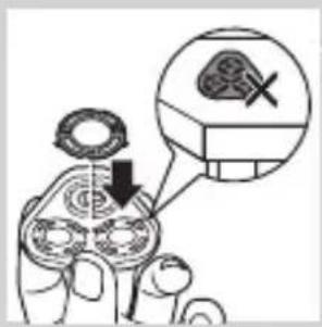 Diagram showing a hand holding a tool with a magnified inset highlighting a specific tool and a crossed-out mark.