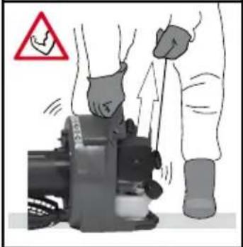 Safety warning illustration showing a hand operating a device with a warning symbol and arrows indicating action