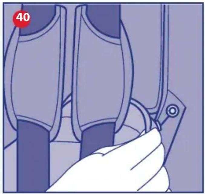 Illustration of a hand holding a tool near mechanical components (no text or symbols)