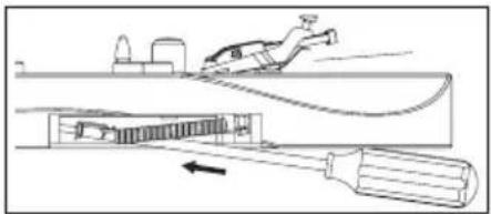 Diagram of a mechanical device with a tool and spring, showing internal components and motion direction (no text or symbols)