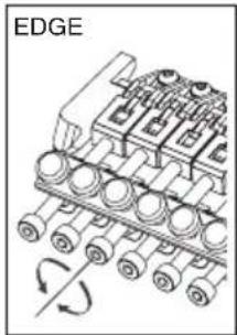 Diagram of an engine block with rotating wheels and a labeled edge (no text or symbols beyond label)