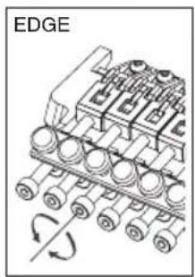 Diagram of an industrial conveyor system with rotating components and a labeled edge (no text or symbols beyond label)