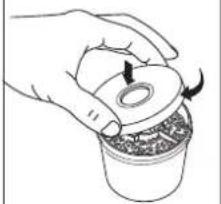 Hand holding a small container with a lid and arrow indicating rotation (no text or symbols)