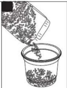 Illustration of a container pouring granular material into a container (no text or symbols)