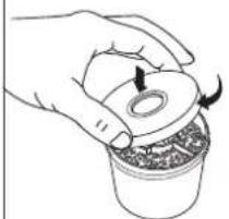 Hand holding a small container with a lid and arrow indicating rotation (no text or symbols)