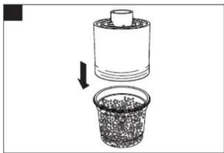 Diagram showing a container being inserted into a granular material, with an arrow indicating the process (no text or symbols present)