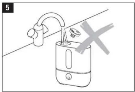 Line drawing of a kitchen sink with faucet and drain, showing no text or symbols