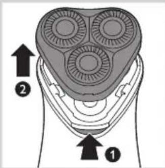 Diagram of a three-sided electric shaver with labeled parts 1 and 2, showing internal structure and directional arrows.