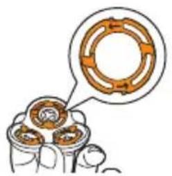 Diagram of a mechanical assembly with three circular components and an inset showing a ring (no text or symbols)