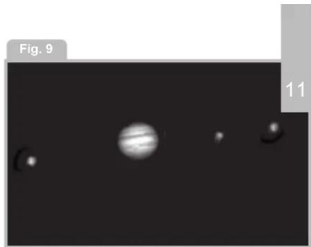 Black-and-white astronomical image showing Jupiter with visible solar panels and faint celestial bodies (no text or symbols)