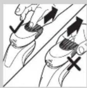 Illustration of two hands holding a tool with directional arrows indicating movement or force (no text or symbols)