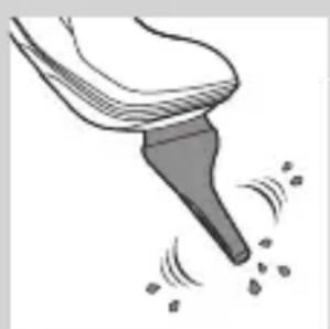 Illustration of a funnel-shaped object emitting particles (no text or symbols)