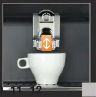 White coffee cup with a mechanical device above it, no visible text or symbols on the device itself.