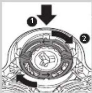 Technical diagram of a mechanical component with labeled parts and directional arrows indicating motion or flow.