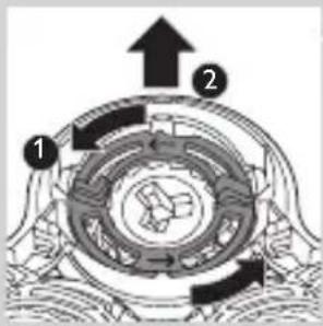 Technical diagram of a mechanical or electrical component with numbered parts and directional arrows indicating flow or movement.
