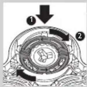 Technical diagram showing a mechanical assembly with labeled components and directional arrows indicating motion or flow.