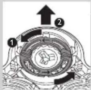 Technical diagram of a mechanical or electrical component with numbered parts and directional arrows indicating flow or movement.